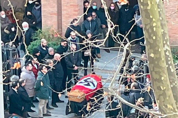 Roman Catholic Church condemns swastika-draped casket at funeral
