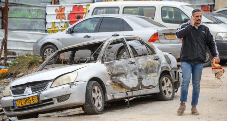 Police arrest Arabs suspected of torching Jewish-owned car in Jerusalem