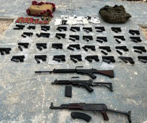 Confiscated-weapons-and-drugs-police-picture
