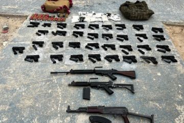 Confiscated-weapons-and-drugs-police-picture