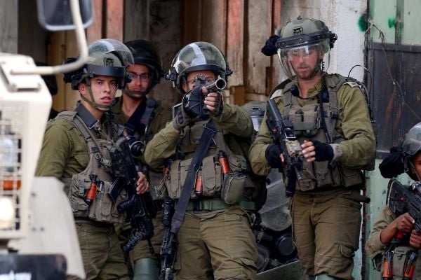 Hebron man throwing firebomb killed in clash with IDF
