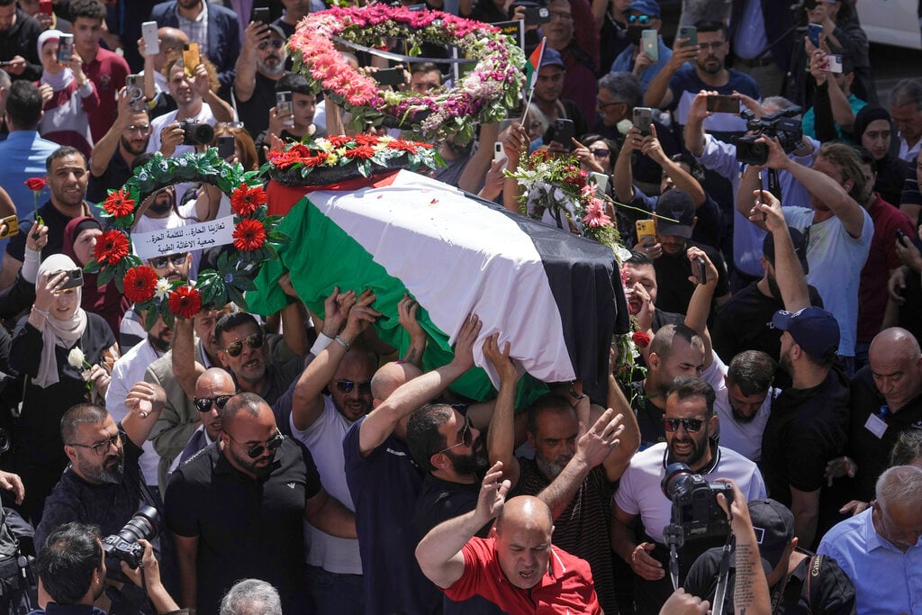 Revealed: Pallbearers at funeral of Al Jazeera reporter were convicted terrorists