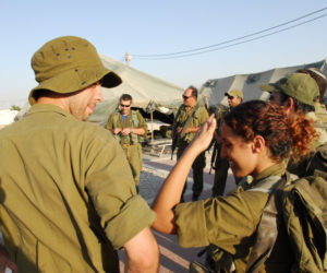 IDF woman and men reserve soldiers during training in the Negev Desert