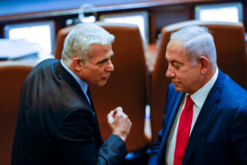 Yair Lapid speaks with Netanyahu in the Knesset