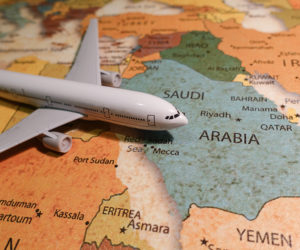Plane on the map of the Saudi Arabia.