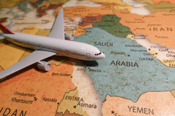 Plane on the map of the Saudi Arabia.