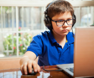 child playing computer games