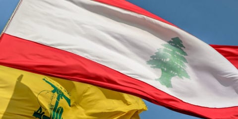 Hezbollah and Lebanese flags.