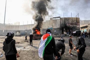 Arab rioters clash with Israeli security personnel in Shuafat