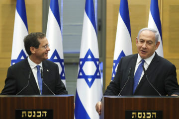 Newly elected Israeli president Isaac Herzog with Israeli Prime Minister Benjamin Netanyahu in the Israeli pariament on the day of the presidential elections, in Jerusalem,