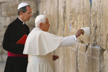 Pope Benedict XVI places a note in the Western Wall, May 12, 2009. (AP Photo/David Silverman, Pool)