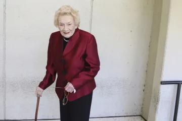 Native Hawaiian heiress Abigail Kawananakoa poses outside a Honolulu courthouse on Oct. 25, 2019. (AP Photo/Jennifer Sinco Kelleher, File)