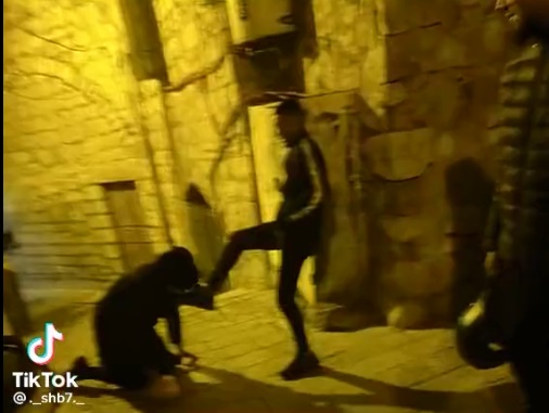 Palestinian teen orders Haredi man to kiss his foot