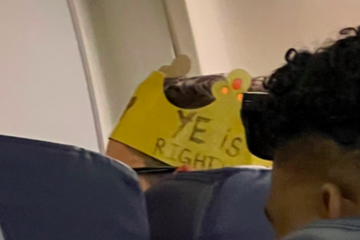 A Southwest Airlines passenger wearing a Burger King crown that states, "Ye is right." Credit: Twitter.