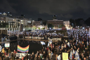 Israelis protest against the government's plans to overhaul the country's legal system, in Tel Aviv, Israel, Saturday, Jan. 14, 2023. (AP Photo/Oded Balilty)