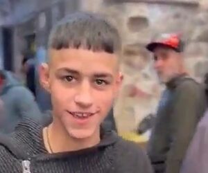 Palestinian child celebrates terror