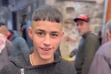 Palestinian child celebrates terror