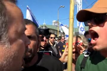 Orthodox Israeli mobbed by protesters