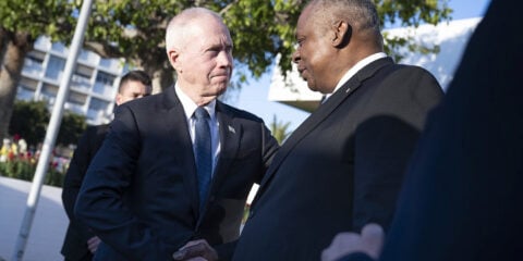 U.S. Defense Secretary Lloyd Austin (right) meets with Israeli Defense Minister Yoav Gallant in Tel Aviv.