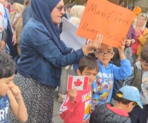Muslim kids stomp on pride flag in Canada