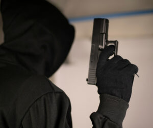 Armed,Robbers,Used,The,Gun,To,Robbery,The,Money,,Uses