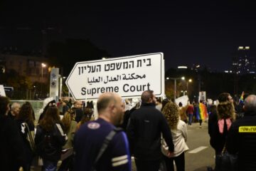 TEL AVIV, ISRAEL - January 21 2023: Israelis protest at Tel Aviv against plans by prime minister Benjamin Netanyahu new government to trample the legal system and the supreme court