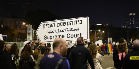 TEL AVIV, ISRAEL - January 21 2023: Israelis protest at Tel Aviv against plans by prime minister Benjamin Netanyahu new government to trample the legal system and the supreme court