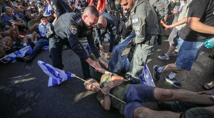 Dozens of anti-government protesters block streets near Knesset