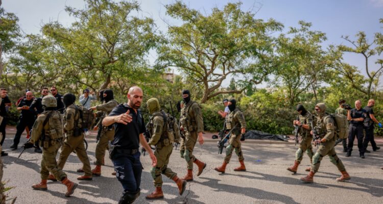 Six Israelis wounded in attack outside of Jerusalem, 2 seriously; terrorist killed, had work permit