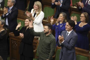 Ukrainian President Volodymyr Zelensky and Prime Minister Justin Trudeau join a standing ovation for Yaroslav Hunka, who was in attendance in the House of Commons in Ottawa, Ontario, on Friday, Sept. 22, 2023. The speaker of Canada’s House of Commons apologized Sunday, Sept. 24, for recognizing Hunka, 98, who fought in a Nazi military unit during World War II.(Patrick Doyle/The Canadian Press via AP)