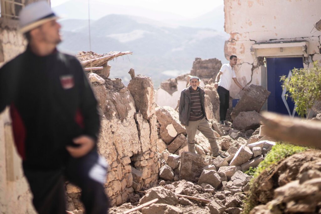 Residents inspect their damaged homes after an earthquake in Moulay Brahim village, near Marrakech, Morocco, on Sept. 9, 2023. Mosa'ab Elshamy/AP