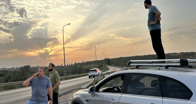Israelis in Samaria line up for guns amid fears war could expand