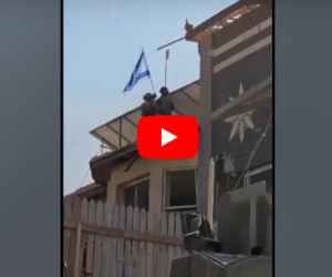 IDF waving flag in Gaza
