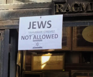 An antisemitic sign displayed outside a bookshop in Istanbul, Turkey
