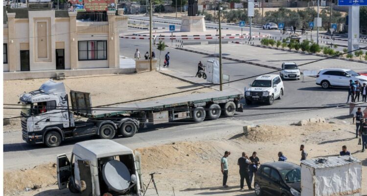 Trucks of goods cross from Egypt into Hamas-ruled Gaza, not checked for weapons