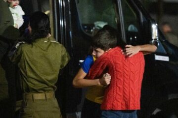 Eitan Yahalomi hugs his mother