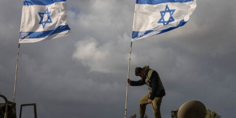 Soldiers, Israeli flag