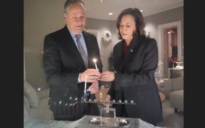 kamala and emhoff light menorah