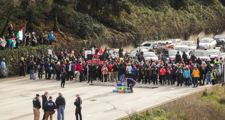 Pro-Palestinian protesters block major Seattle highway for hours