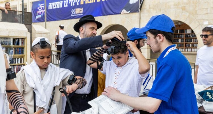 Undeterred by Iranian attack, 122 Israeli orphans celebrate Bar Mitzvah together at Western Wall