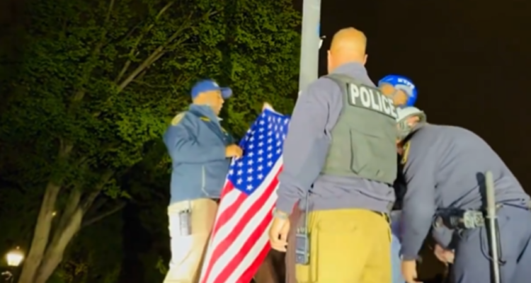 NYPD reclaims city college, lowers terror flag, raises U.S. flag