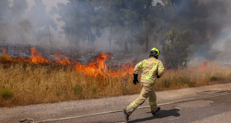 Firefighters battle blazes amid heatwave as Hezbollah attacks continue