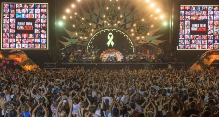 Tens of thousands crowd Tel Aviv park for first Nova concert since Oct. 7 massacre