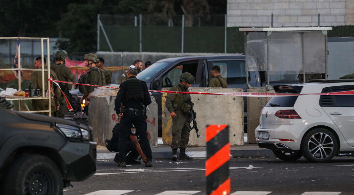 Israeli man shot at, stabbed outside Hebron