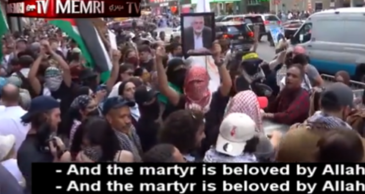 Times Square rally features Hamas and Hezbollah flags, portrait of Haniyeh