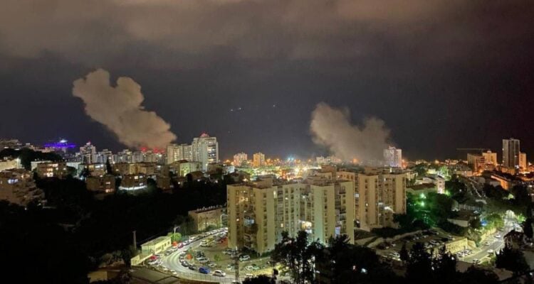 Six Israelis hurt as Hezbollah rockets hit Haifa, Tiberias