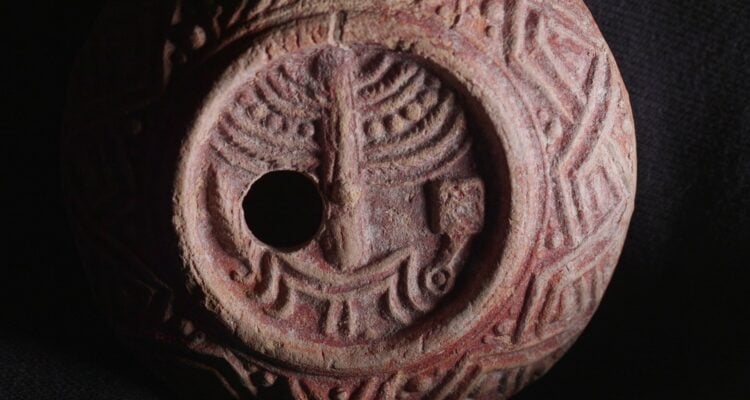 Ancient oil lamp, decorated with Temple symbols, discovered in Jerusalem