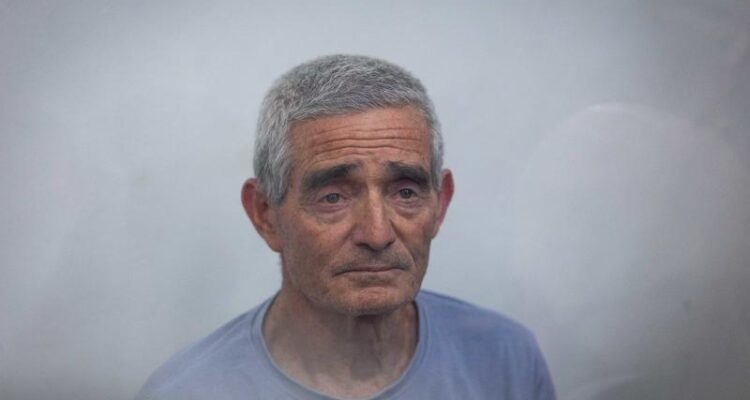 Police seize rifles, ammo at home of leading anti-government activist