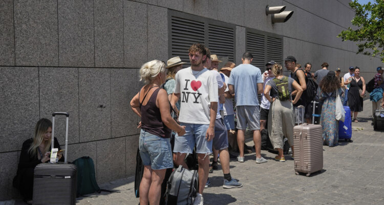 US puts Israel on highest travel warning level as foreigners evacuate