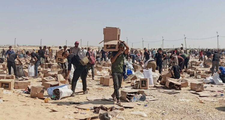 Gaza aid group blames Hamas after 20 killed in stampede and stabbing